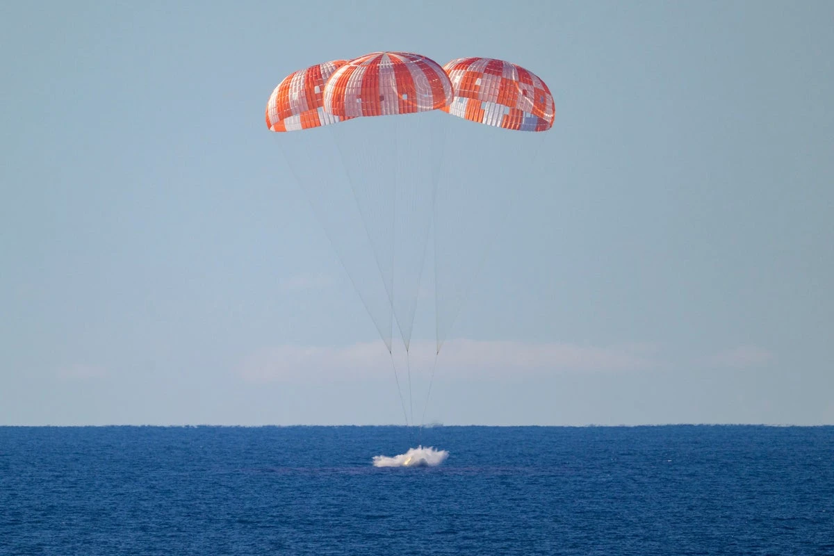 First manned Moon mission in more than 50 years splashes down after epic voyage