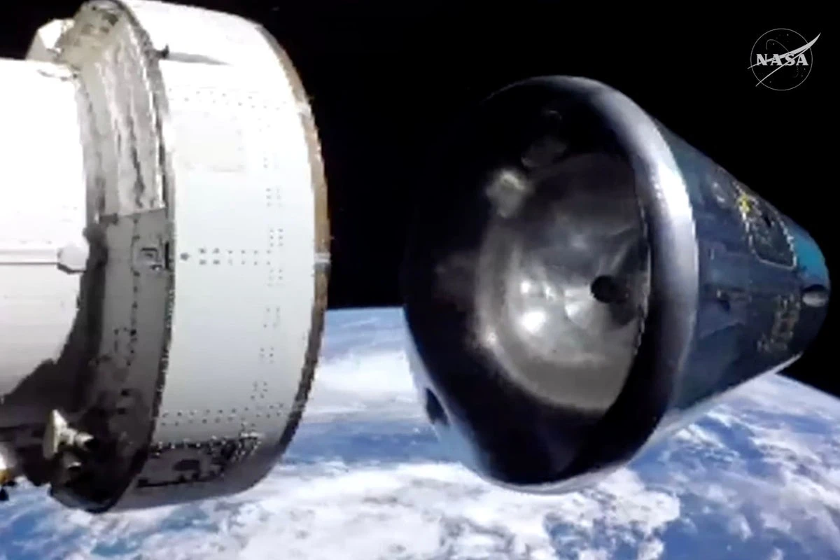 First manned Moon mission in more than 50 years splashes down after epic voyage