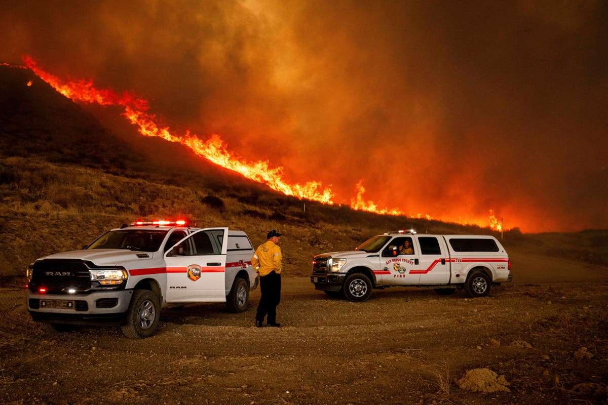 Thousands evacuated as Hughes fire breaks out amid strong winds