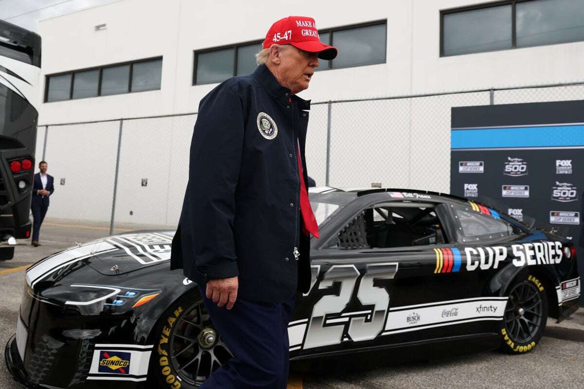 Trump drives around Daytona 500 track as he guts federal workforce