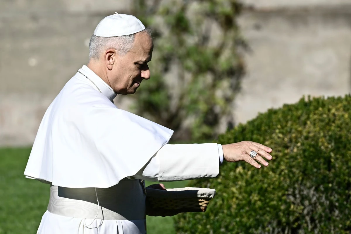 Pope feeds fish as he explores the Vatican’s new eco-friendly farm