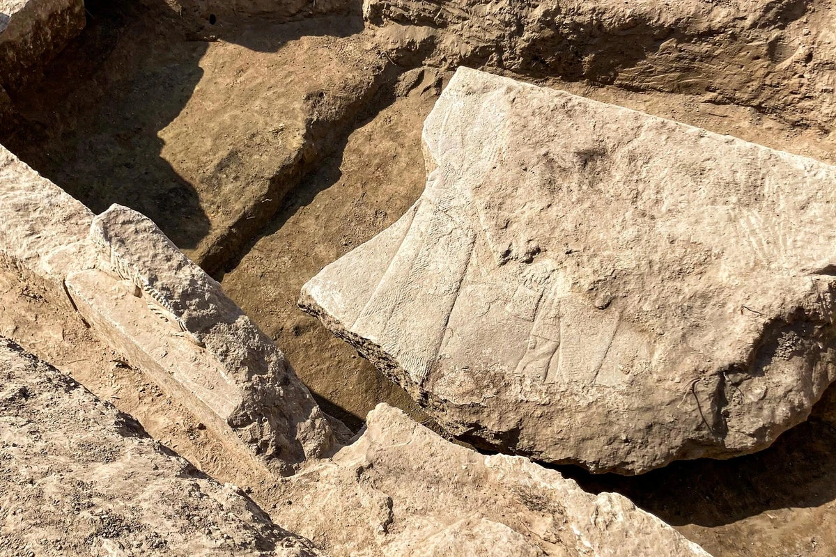 Rare stone carving found depicting Assyrian king surrounded by gods