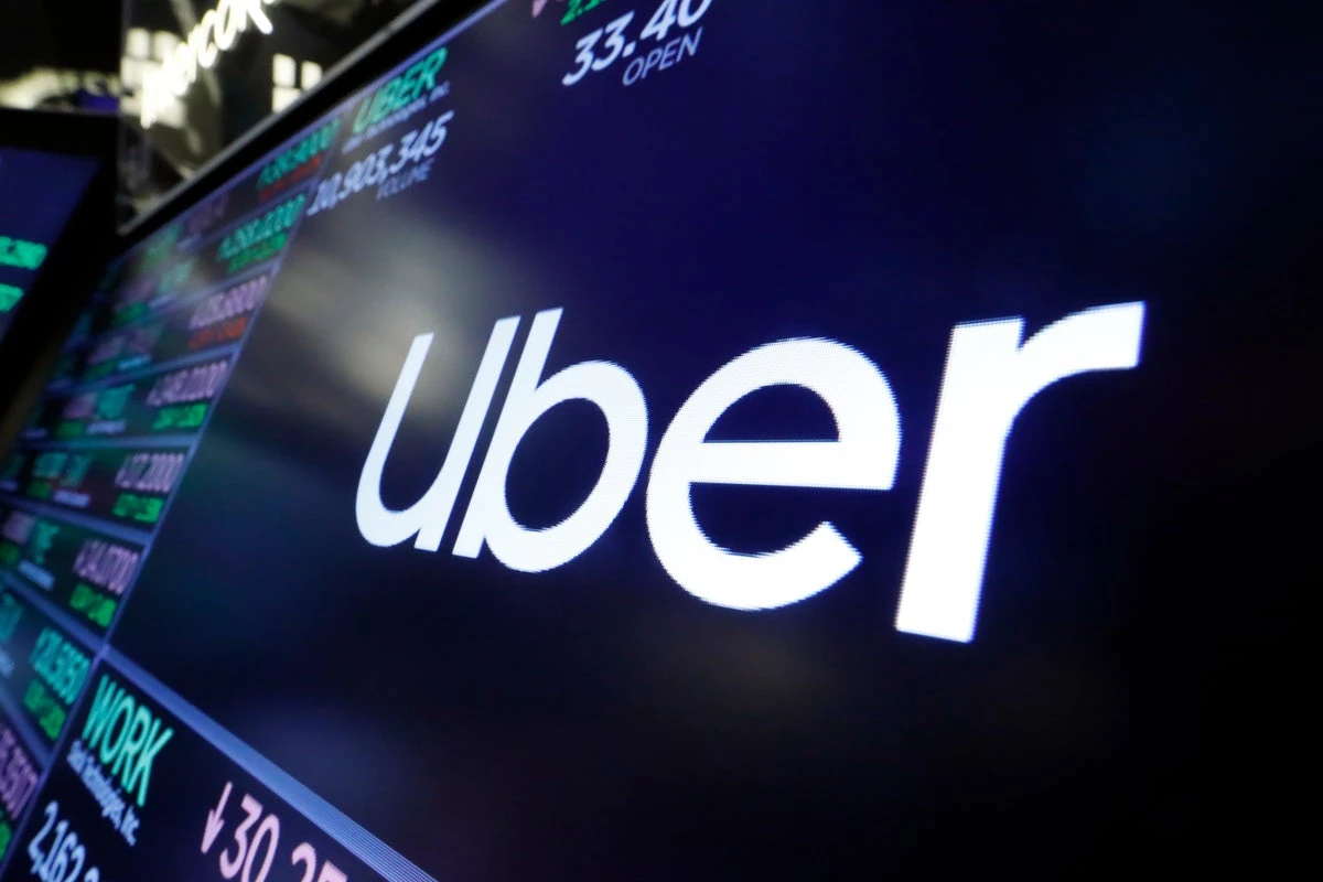 Uber shares surge as forecast signals ride hailing and delivery demand