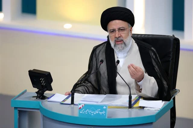 Iran judiciary chief stages 1st campaign rally despite virus