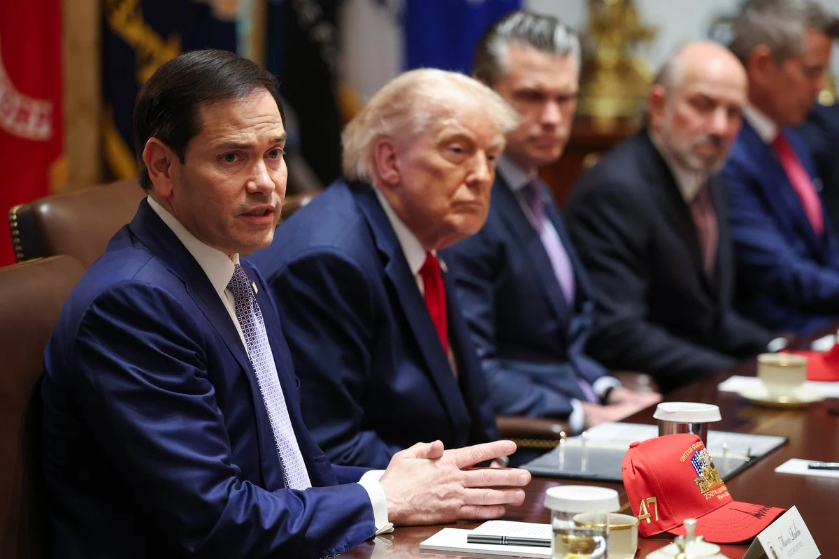 Trump slaps Hegseth arm and says ‘He loves war’ in Cabinet kickoff