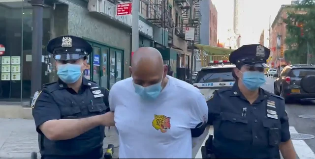 Husband arrested after woman beaten with crow bar at bus stop dies