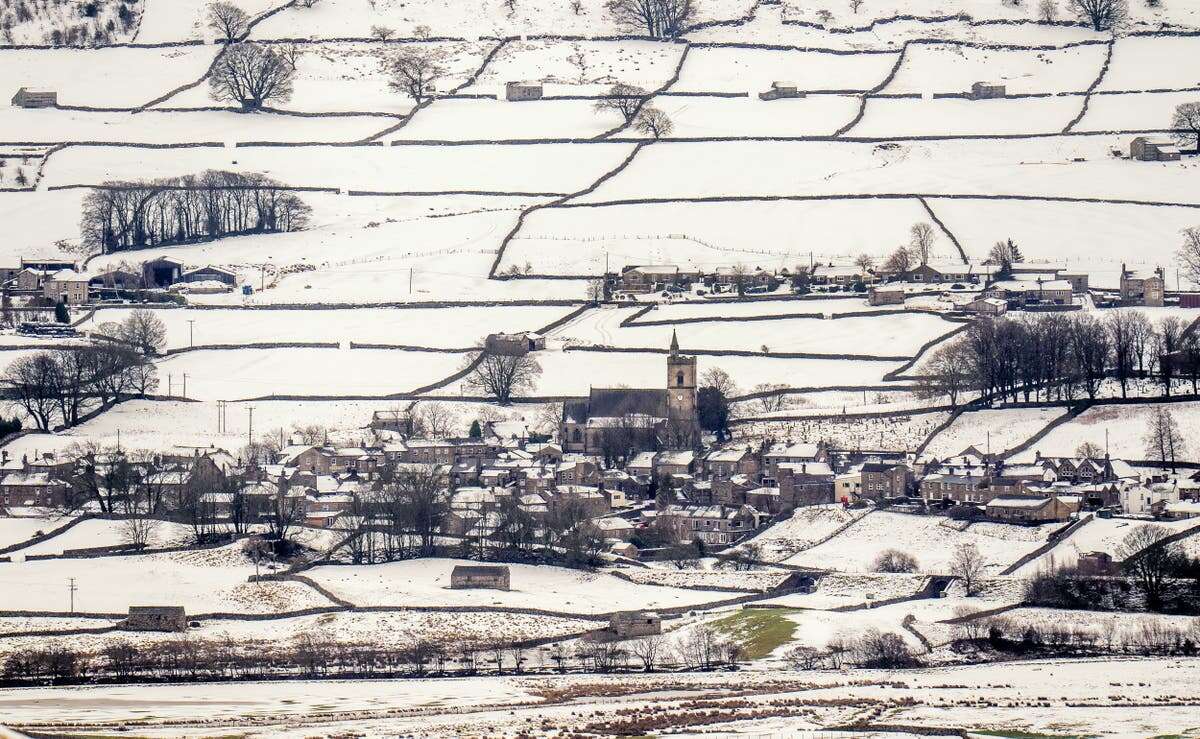 New snow warnings amid travel chaos and major incidents over flooding