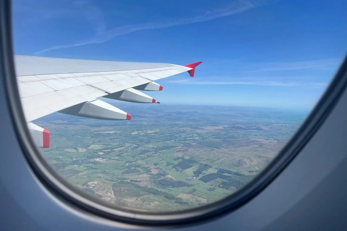 Couple escape on business class flight after $2m fraud