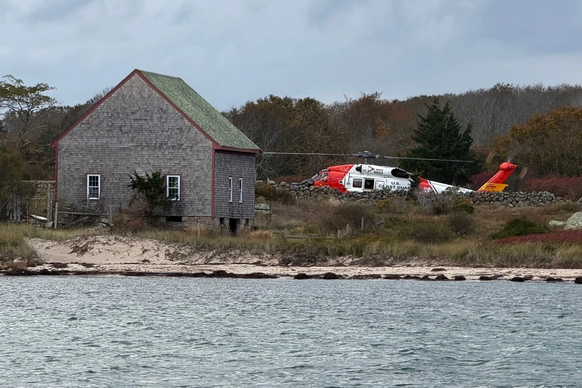 Woman dies after boat fire left her stranded on island with family