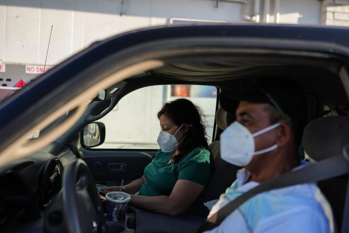 Thousands return home after chemical tank threat, but fears linger