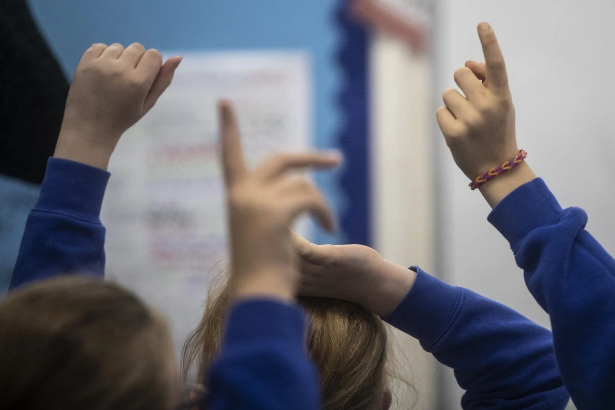 Teacher awarded five-figure payout after pupil threw laptop at her