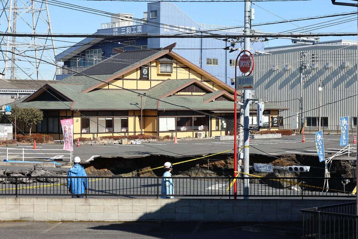 Japanese city told to use less water to help sinkhole rescue