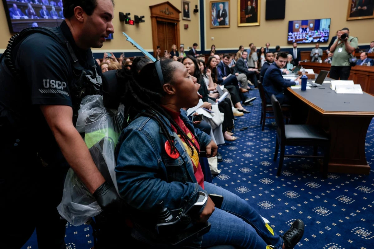 Protesters in wheelchairs dragged out of House Medicaid meeting