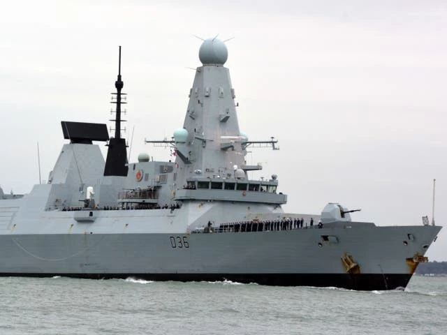 Russia says warning shots fired at UK warship