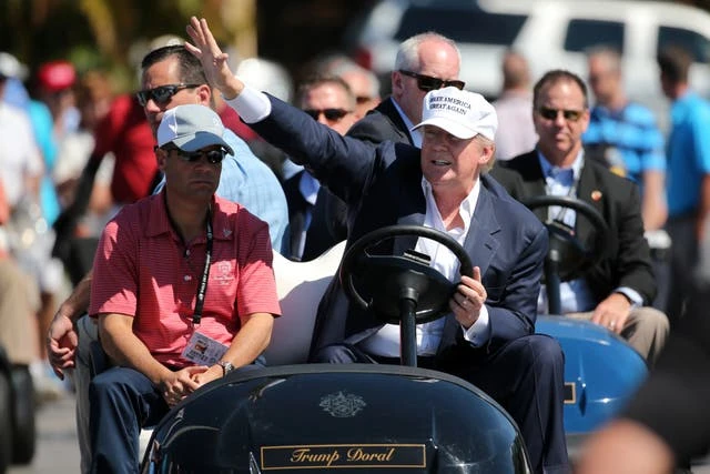 Trump wanders into Mar-a-Lago events looking for praise, report claims