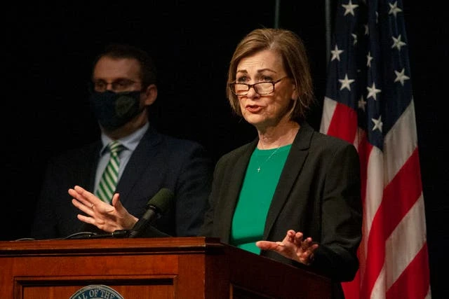 Iowa governor questions migrant flights into Des Moines