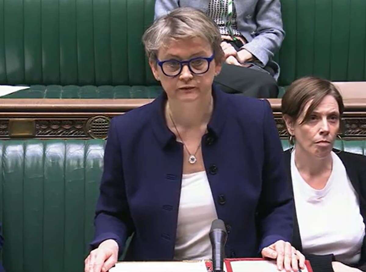 Yvette Cooper says professionals will be forced to report child abuse