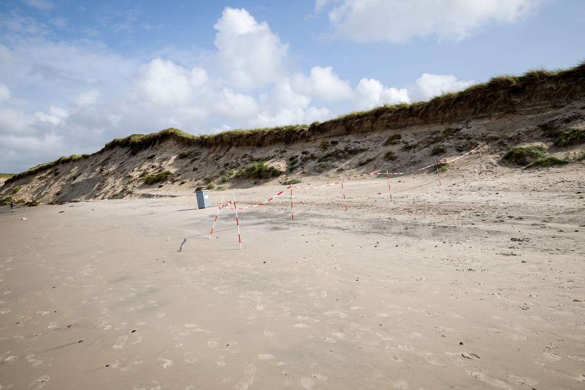 Two boys die after being buried in sand while digging hole on beach