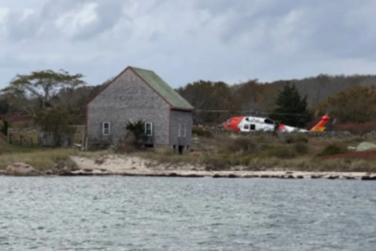 Family rescued from Massachusetts island after their boat caught fire