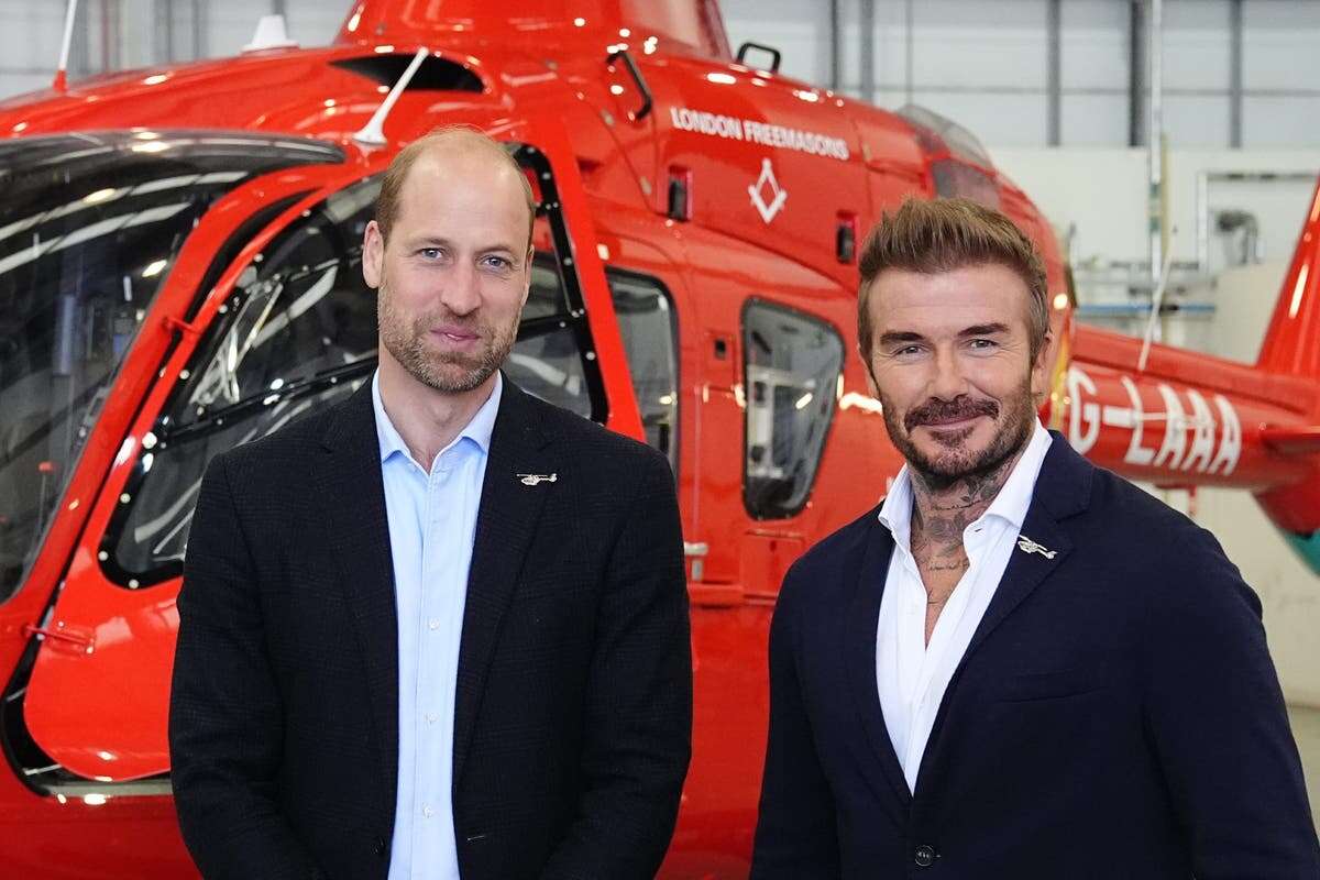 William meets David Beckham as he steps out in London