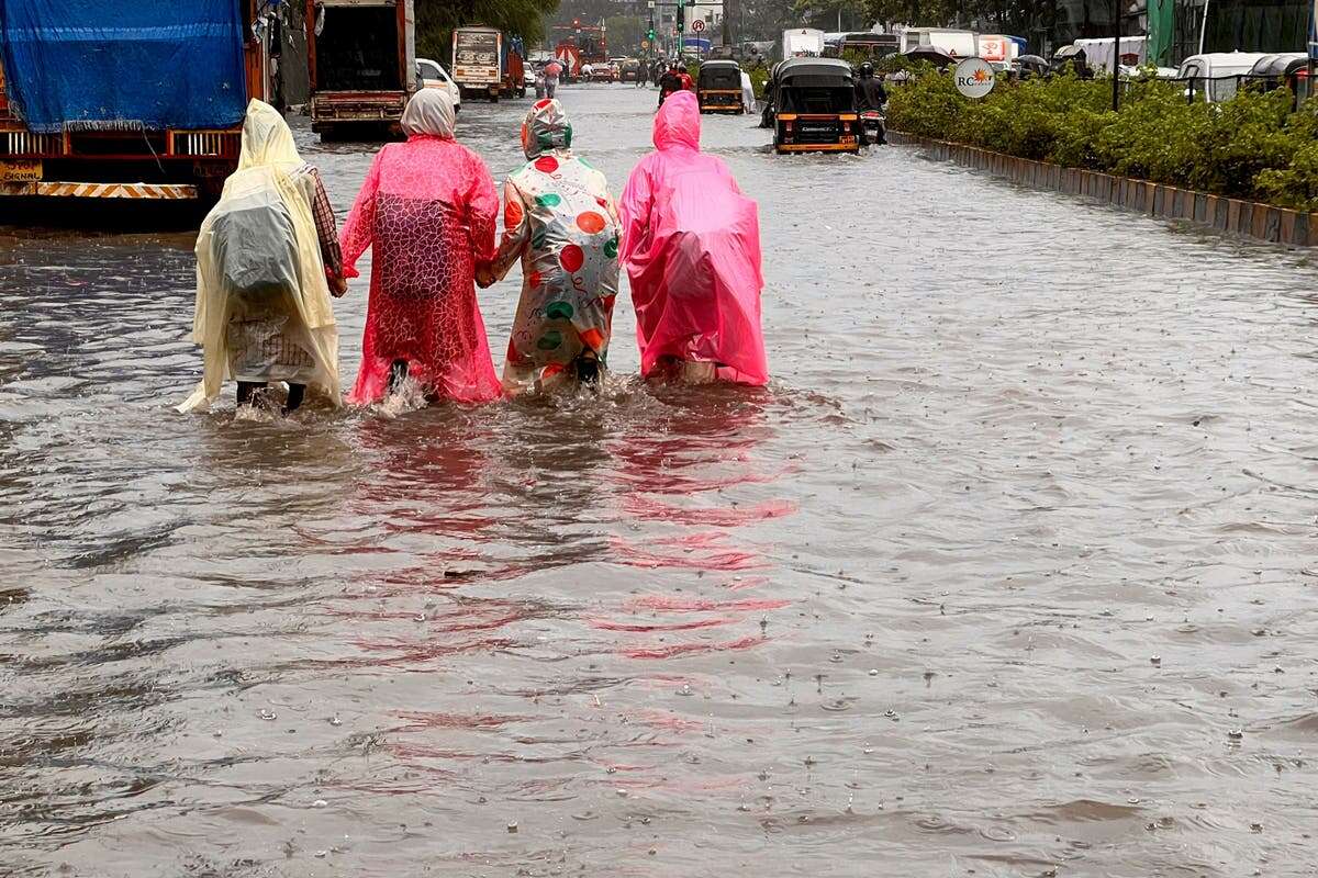 Four dead and flights cancelled as Mumbai gets flooding red alert