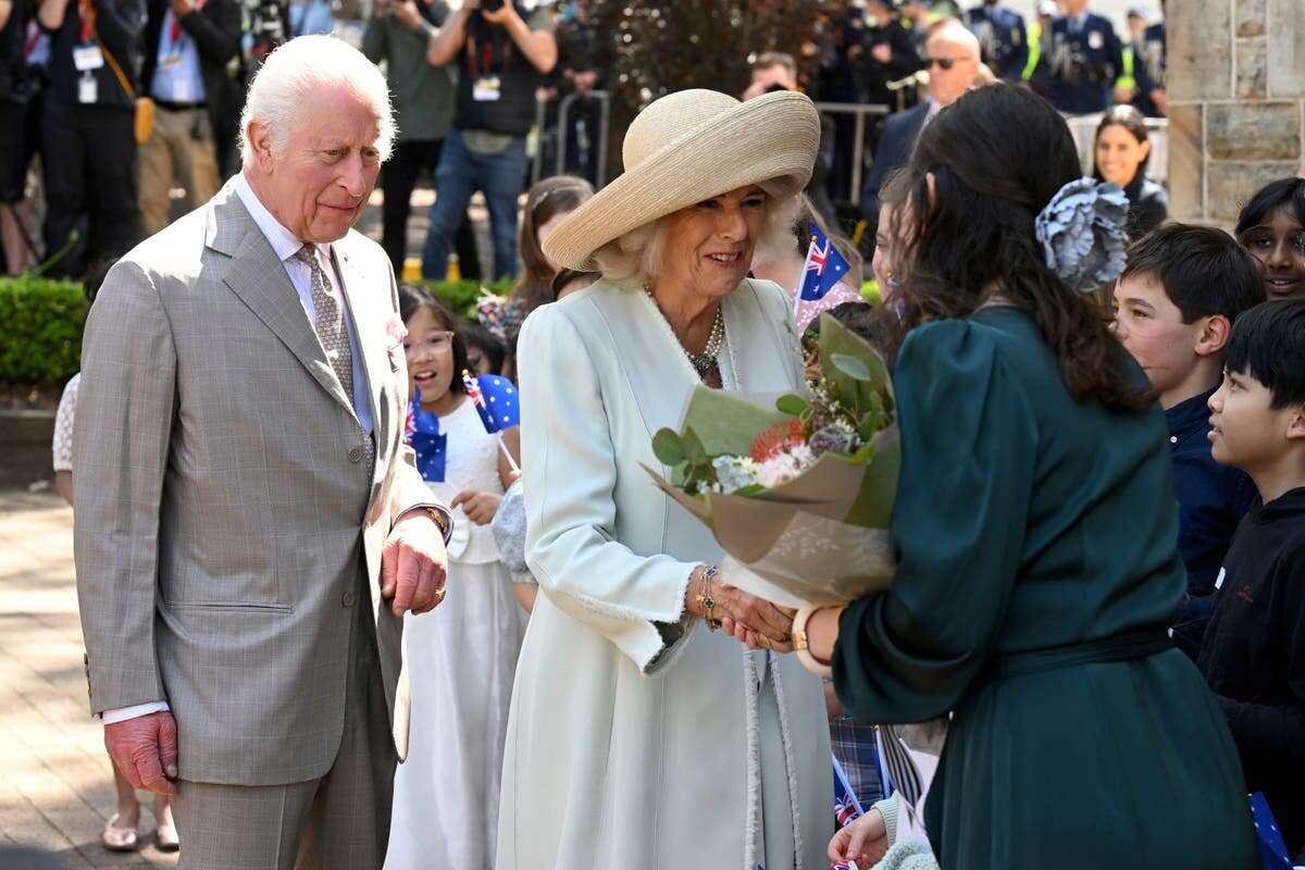 King Charles III and Queen Camilla greeted by children in Sydney