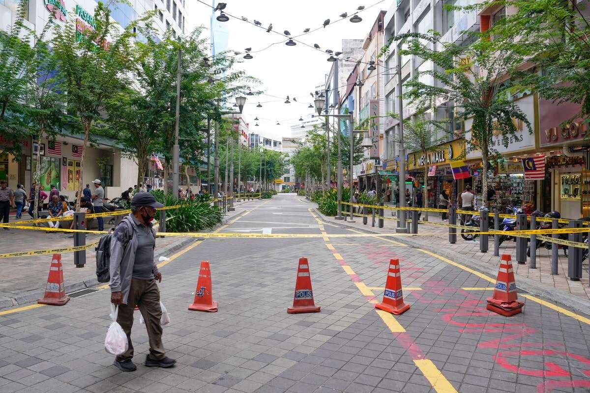 Search for tourist who fell into sinkhole while on holiday in Malaysia