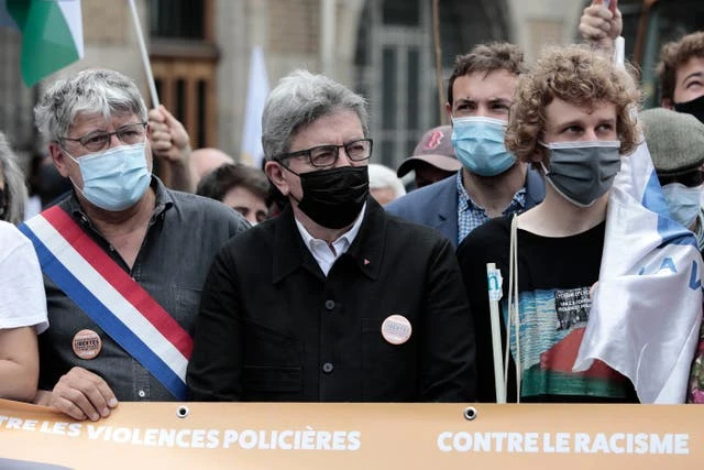 French far-left chief floured in march against far right