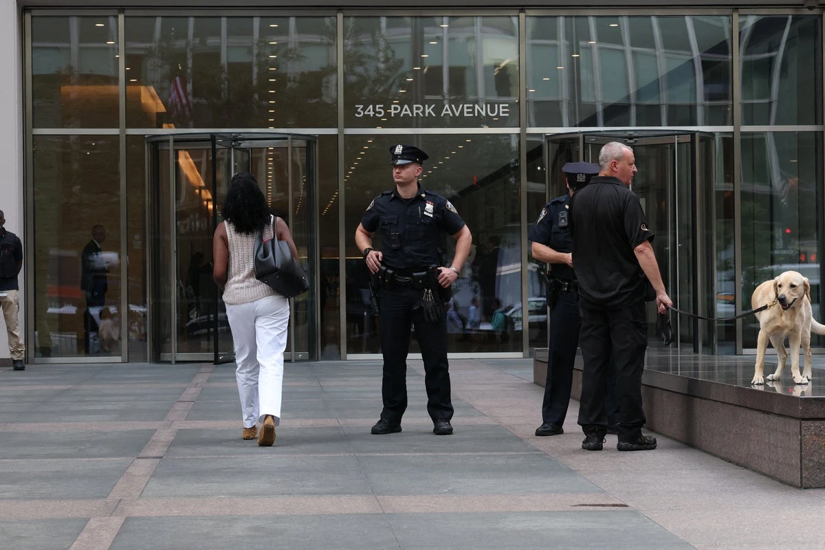 Staff return to 345 Park Avenue one week after New York mass shooting