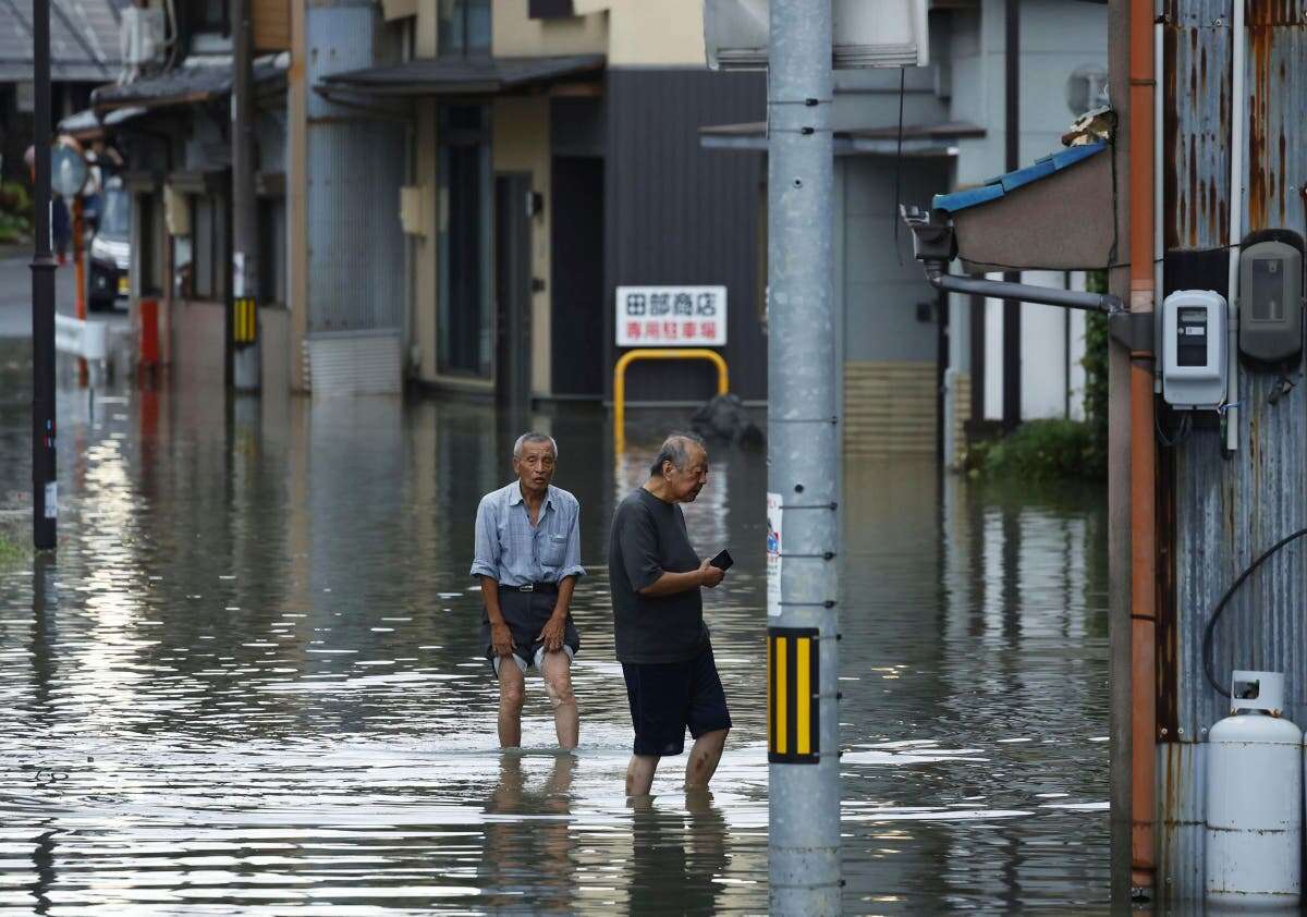 Japan under flood alert after record rainfall even as Shanshan weakens