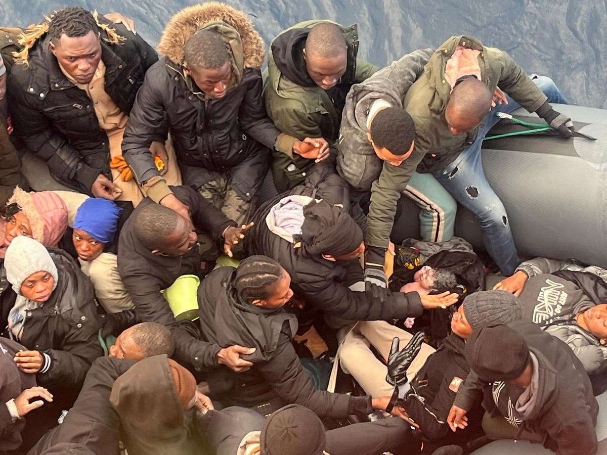 Moment newborn baby found on migrant boat off coast of Canary Islands