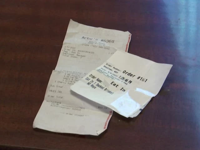 Arby's fires employee who put homophobic slur on couple's check