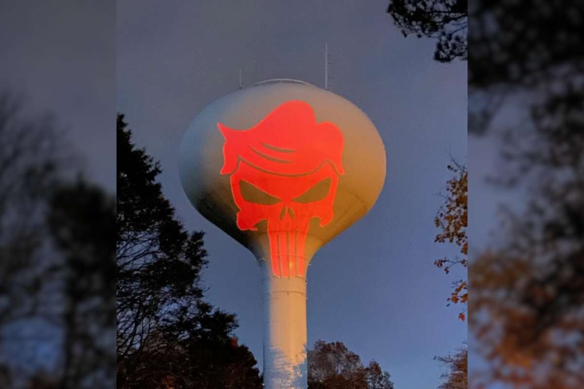 MAGA supporter sparks outrage for projecting Trump image on tower