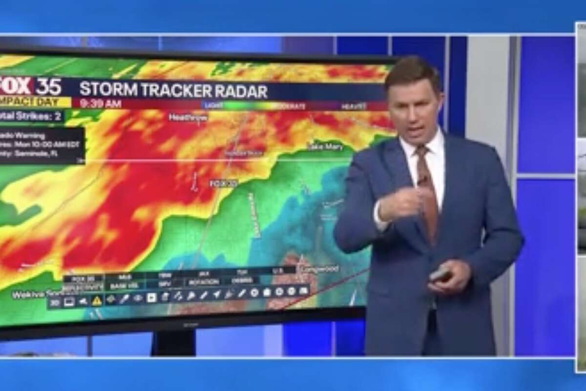 Tornado hits TV station as weatherman is issuing warnings about storm