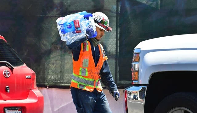 Doctors warn of burning roads as 200 temperature records set to fall