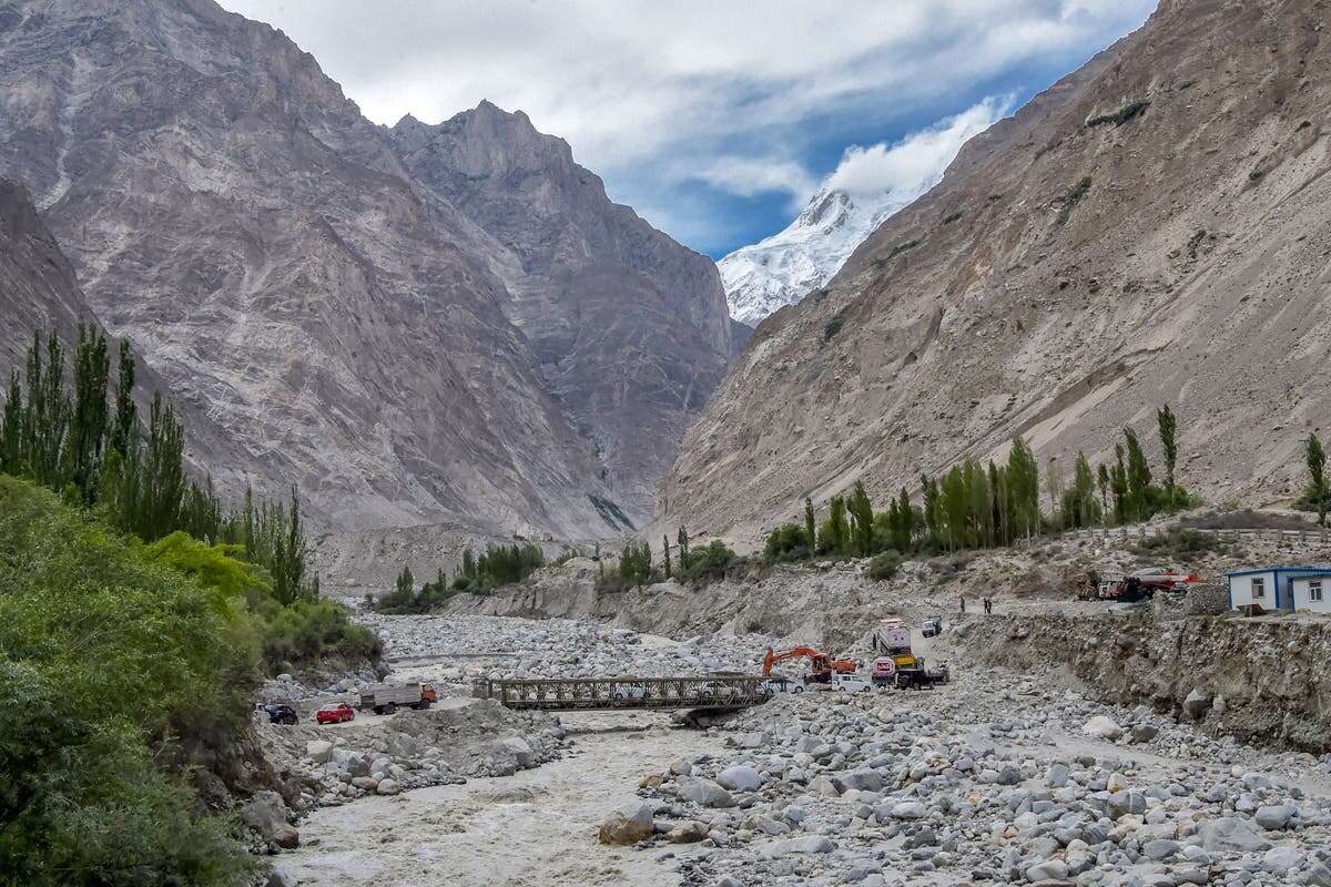 Newlywed couple among 14 dead as bus plunges into Indus river