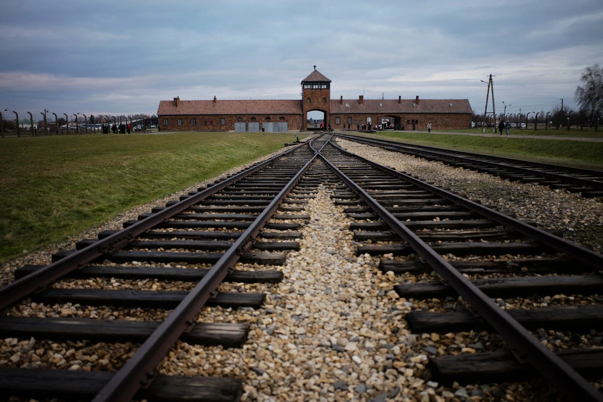 Barstool Sports founder retracts Auschwitz tour offer to customer in antisemitic sign incident