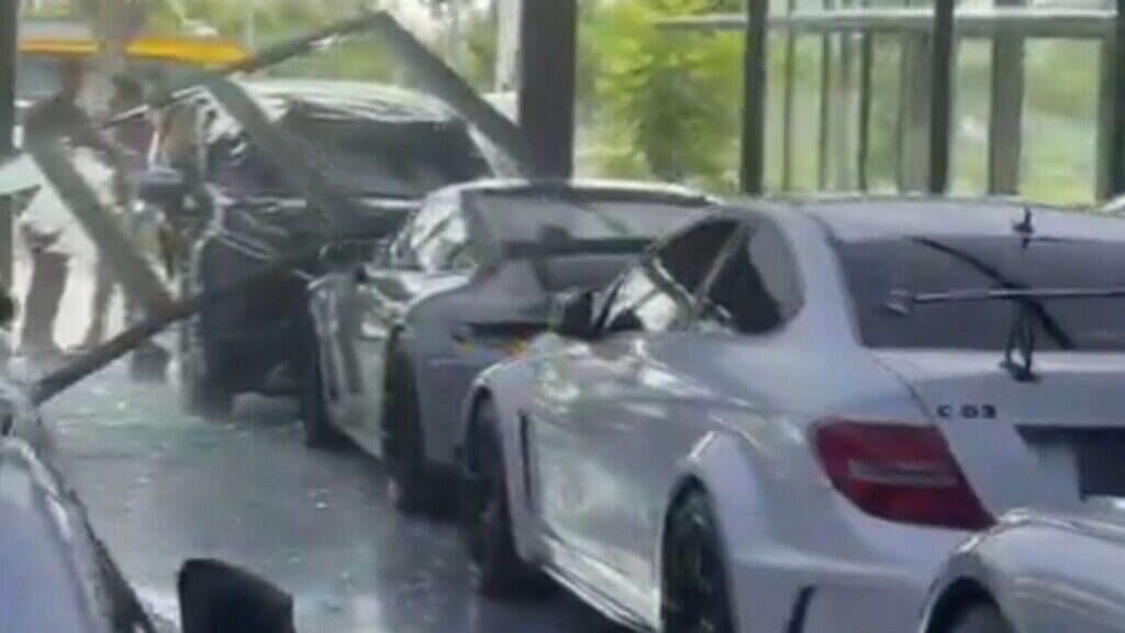 Runaway SUV Plows Into Luxury Car Dealer In Indonesia, Wrecks Porsche GT3