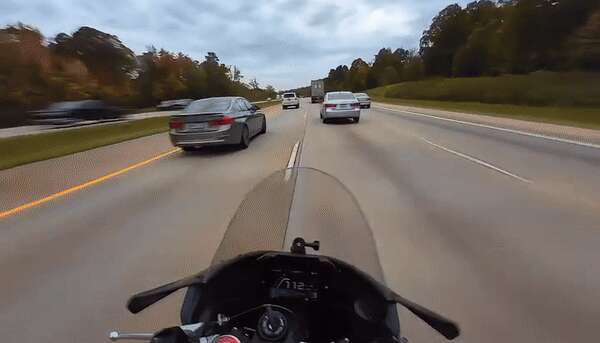 Lane-Splitting Biker Clipped By BMW At 104 MPH Pulls Off Miracle Save