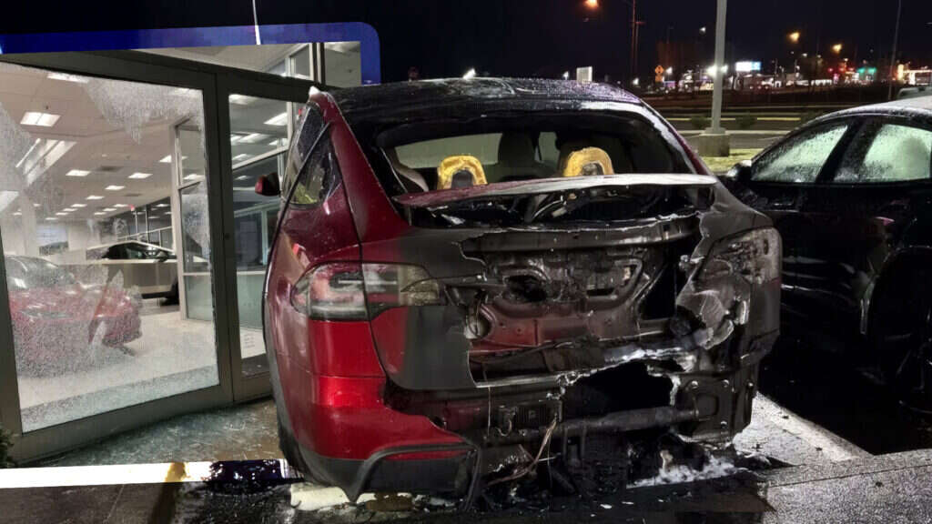 Man Arrested After Alleged Molotov Cocktail Attack And Shooting At Tesla Store