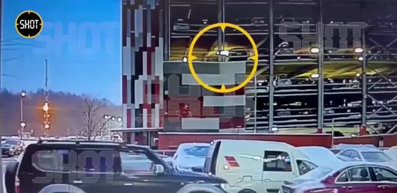 Man Walks Away After VW Nosedives 40ft From 4-Story Parking Garage