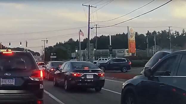 Yeehaw! Watch Dodge Challenger Pass Traffic On Two Wheels Before Smashing Into A Starbucks