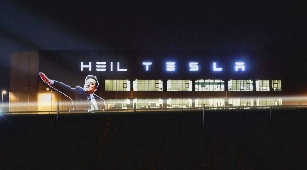 Activists Protest Musk With Projections On Tesla’s Giga Berlin