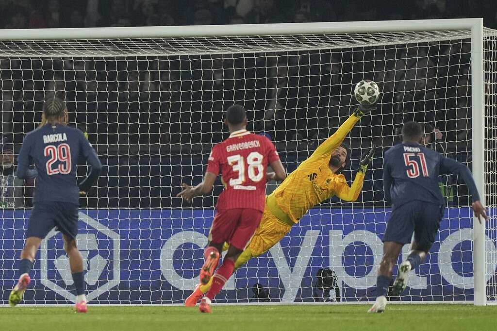 Champions League review: 10-man Barcelona win at Benfica, Liverpool stun PSG