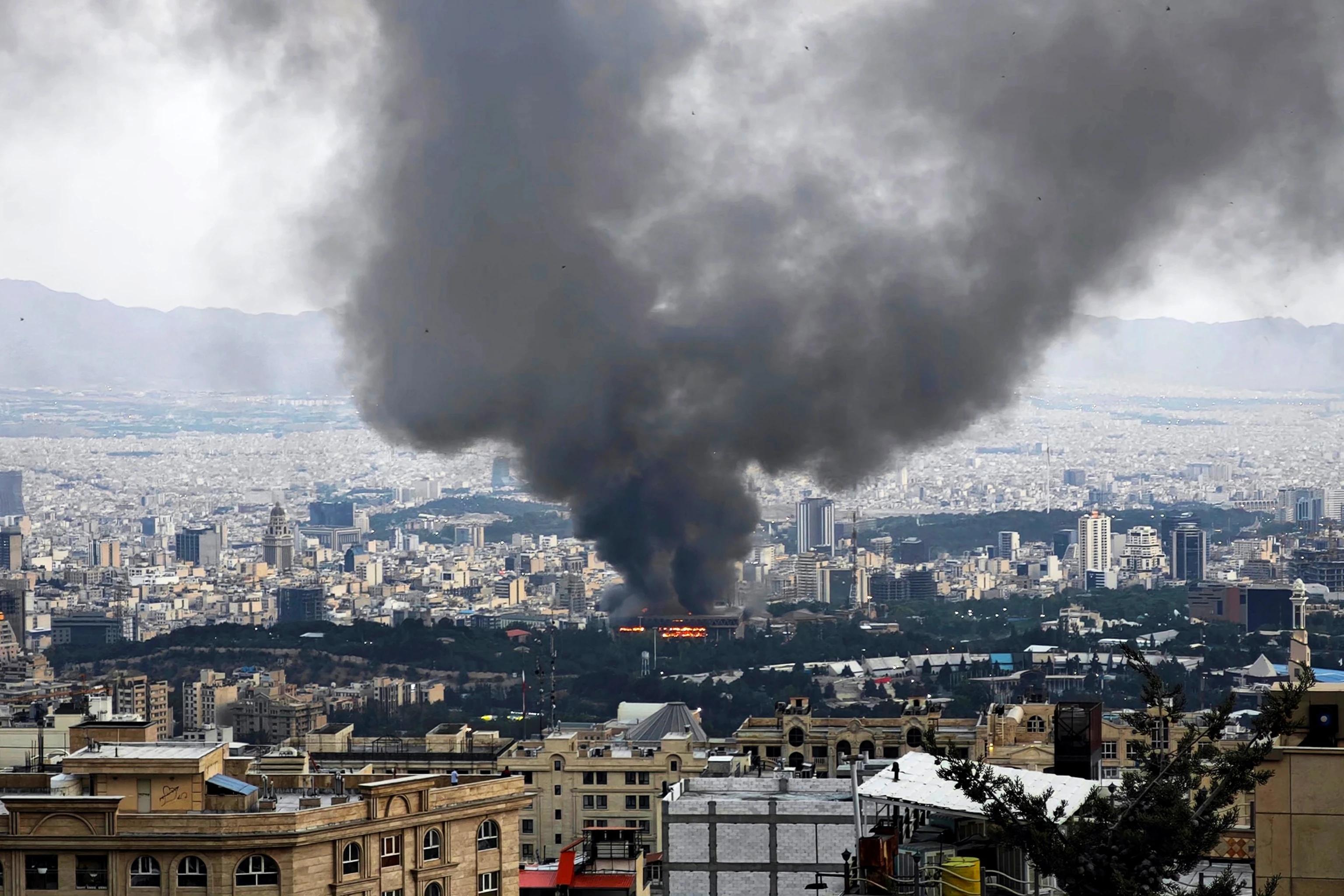 Iran state broadcaster building ablaze after Israeli airstrike, resumes transmission hours later