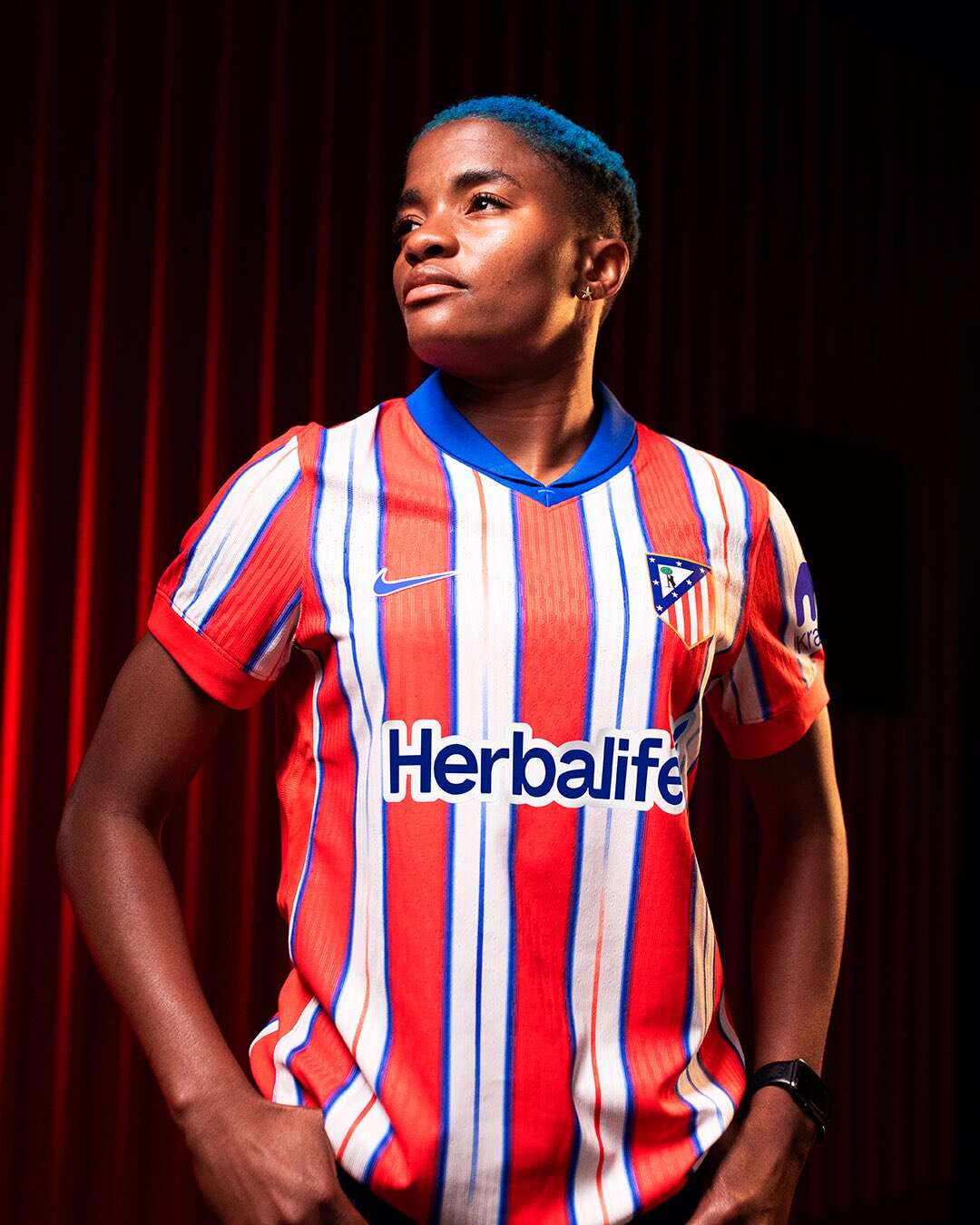 Super Falcons captain Ajibade models Atletico Madrid’s new kit