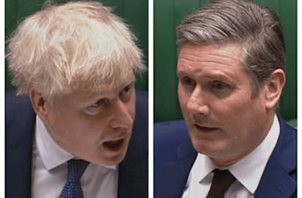 Johnson defends Covid-19 strategy as Starmer demands short lockdown from Friday
