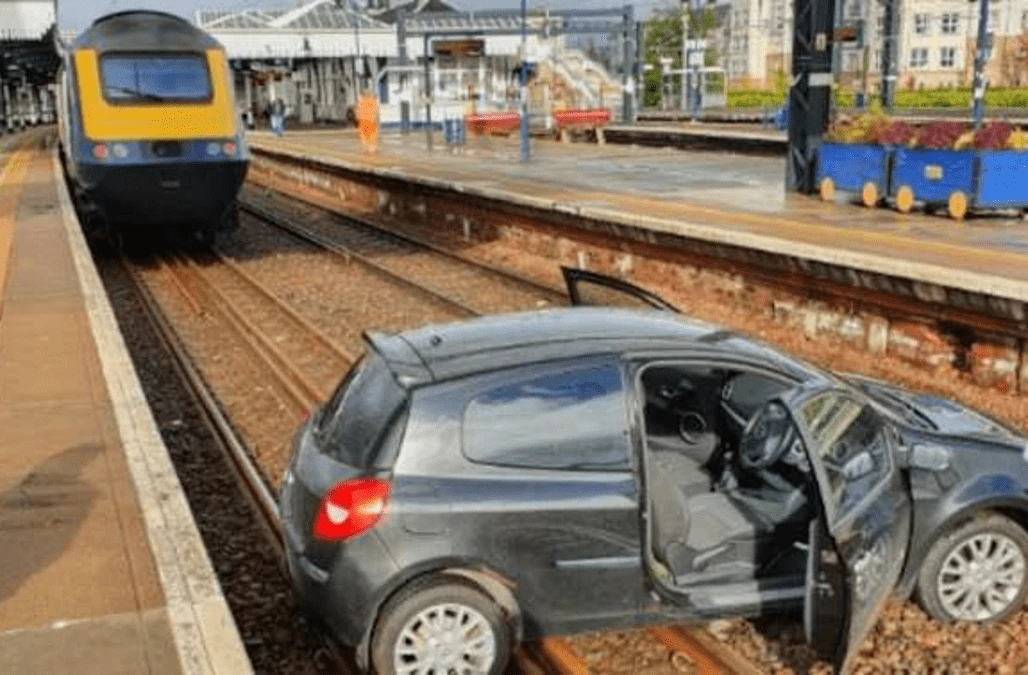In Video: Car that landed on tracks at Stirling station removed