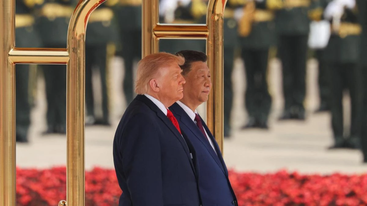 Donald Trump en China, Kiev bajo las bombas y otras imágenes del día