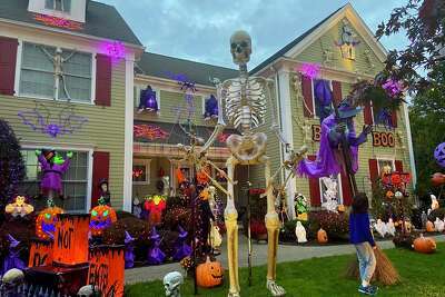 12-foot skeletons tower over CT lawns during Halloween season